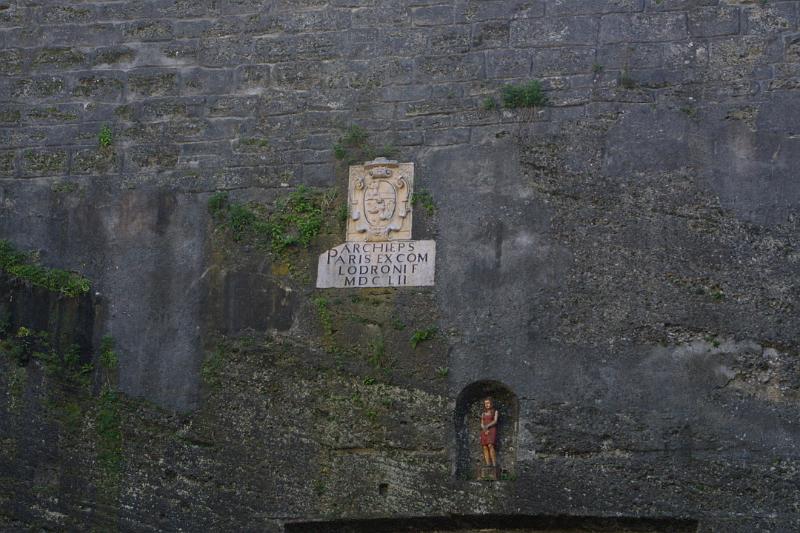 00343.jpg - Archbishop's plaque in cliff. (I don't know about the girl statue)