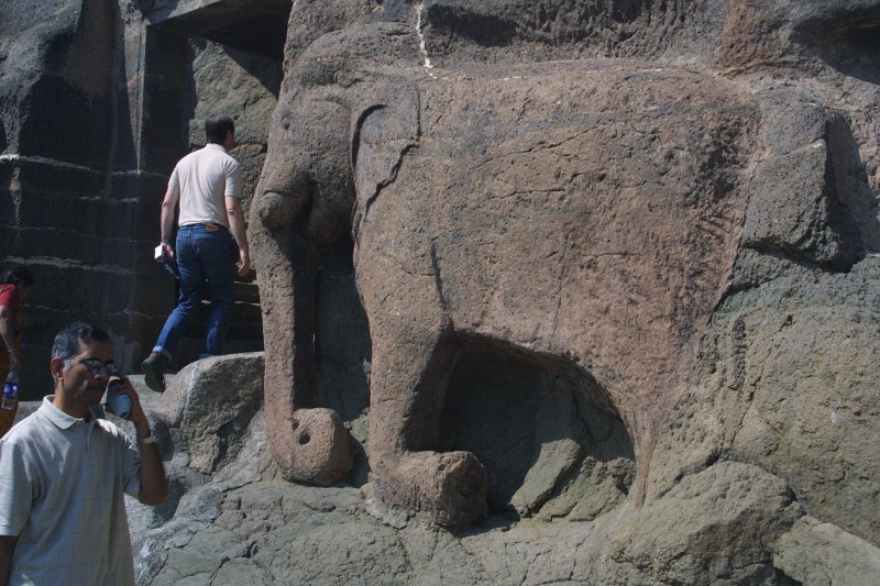2057000_KnealingElephantAjantaCaves.jpg - Kneeling elephant carving. The Ajanta Caves.