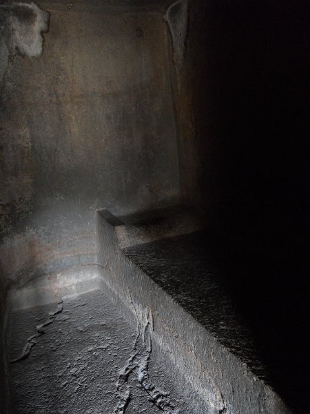 2057121_MonksBedAjantaCaves.jpg - Inside a monk's cell. The Ajanta Caves.