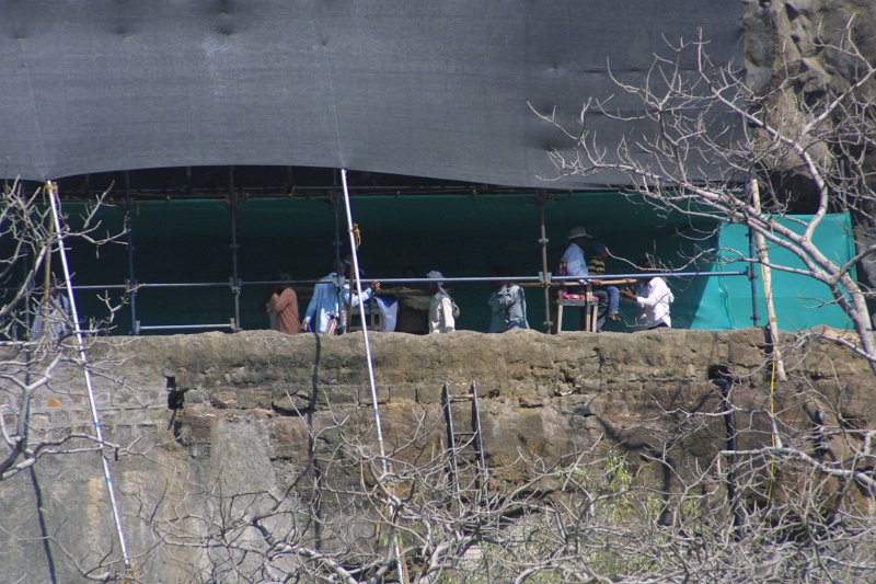 2059000_PeopleOnLittersAjantaCaves.jpg - People being carried on litters. The Ajanta Caves.