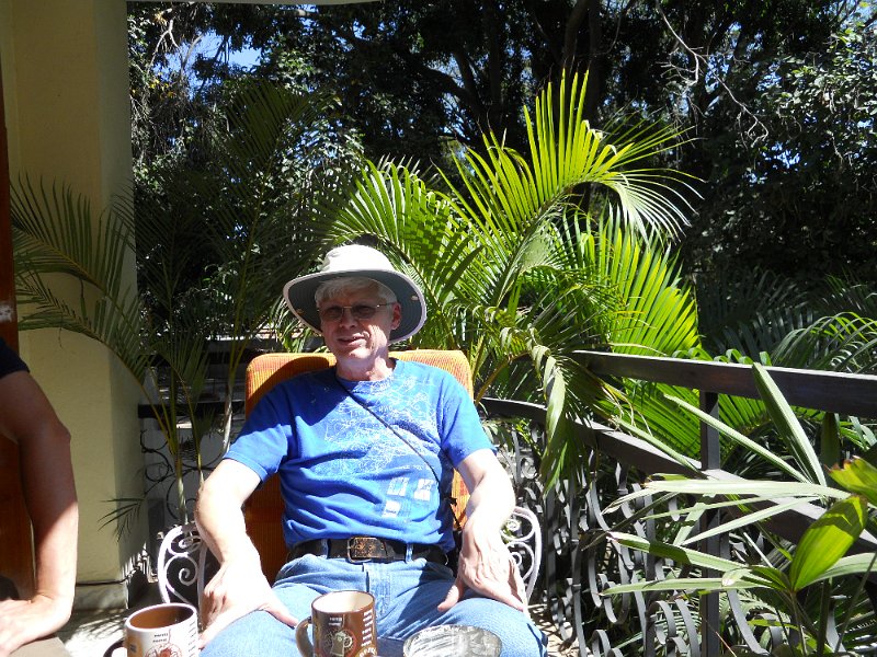 1001569_JimOnBalconyDefenseColony.jpg - Jim at breakfast. Defence Colony, Bangalore