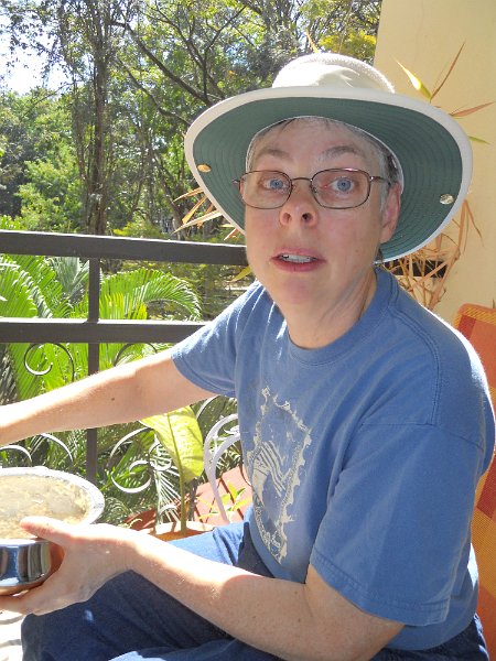 1001575_KathyOnBalconyDefenseColony.jpg - Kathy having breakfast. Defence Colony, Bangalore.