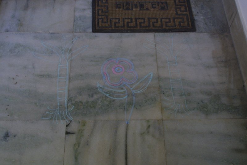 1039000_DefenseColony.jpg - Drawing on floor in front of Jen and Martin's Apartment.