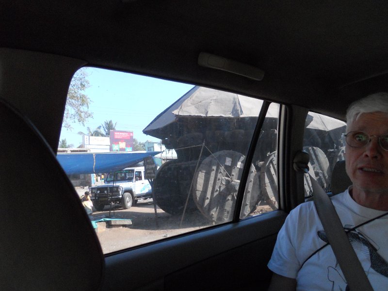 1430731_JimAndLargeWheeledCarts.jpg - Large chariot beside the road (and a terrified Jim)