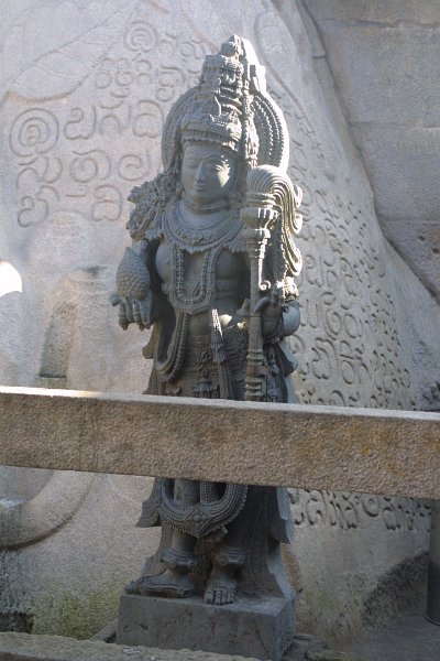 1528000_GuardianSrivanaBegolaKarnataka.jpg - Guardian statue beside the colossus. Sharavanabelagola