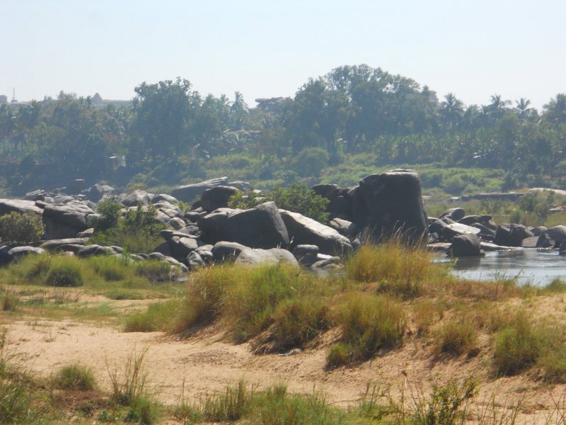 1129652_TungabhadraRiverShore.jpg - Boulders along the river at Hampi.