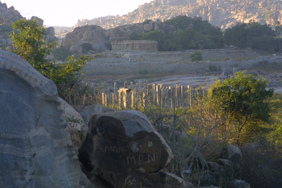 1236000_DistantRuinsAndHillsHampi.jpg - Chandramouliswara temple and ancient bridge ruins. Hampi.