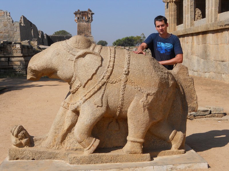 1290669_MartinAtMuseumHampi.jpg - Martin with the stone elephant in front of the Museum inside the Zenana Enclosure. Hampi.