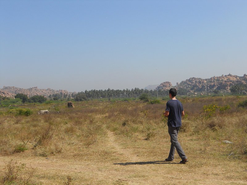 1302681_MartinBeyondJainaTempleHampi.jpg - Martin heads out beyond the Jaina Temple. Hampi.