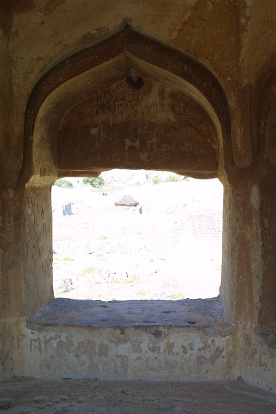 1378000_ViewFromBandTowerDannayakaEnclosureHampi.jpg - Window in the band Tower. Hampi.