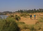 1130000_JenKathyOnRiverShoreHampi