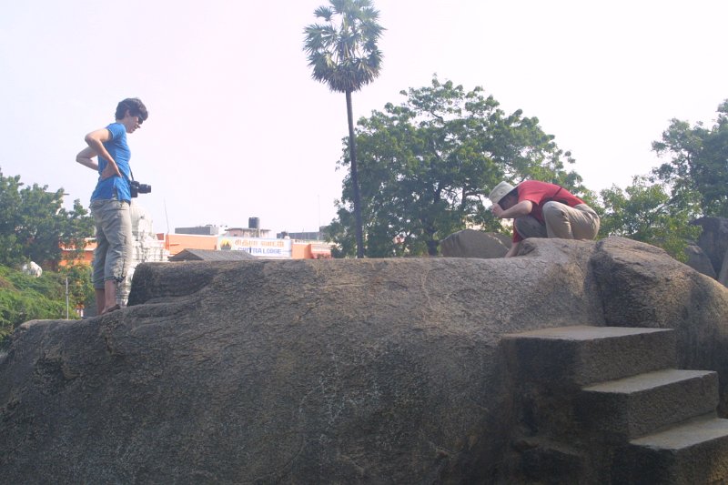 1958000_JenAndKathyOnRockcutWell.jpg - Jen and Kathy examine the Rock Cut Well at the Trimurti Cave Temple. Mahabalipuram.
