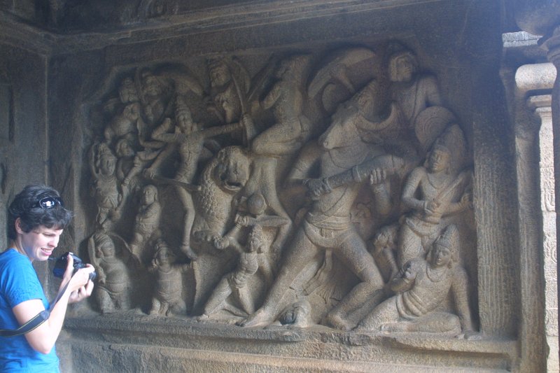 1991000_InsideRockCutTemple.jpg - Carving of Mahishasuramardhini attacking a buffalo deamon. Mahabalipuram.