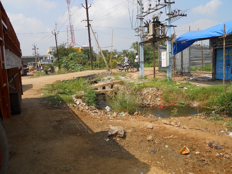 1681868_OnTheRoadTamilNadu.jpg - We stopped to buy cell phone minutes by the road in Tanil Nadu.