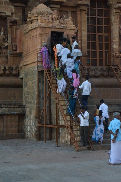 1742000_WorshipersAtBrihadisvaraTemple.jpg - People entering the Dakshinamoorthi Temple at the Brihadisvara Temple. Thanjavur.