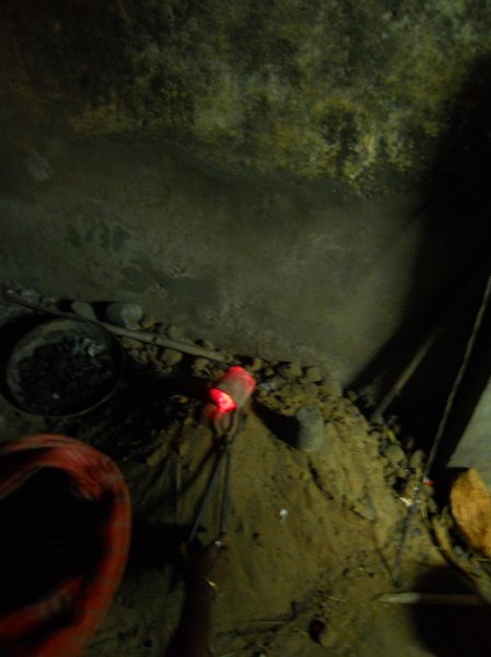 1742909_MetalStatuesByHandThanjavur.jpg - Pouring the molten metal into the mould. Thanjavur.