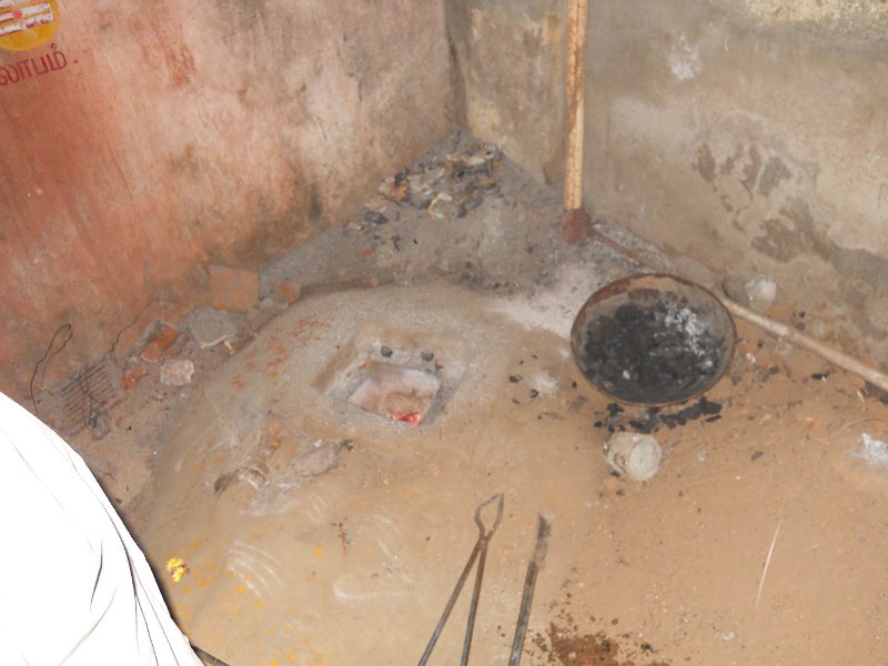 1742911_MetalStatuesByHandThanjavur.jpg - The forge where the metal is prepared.